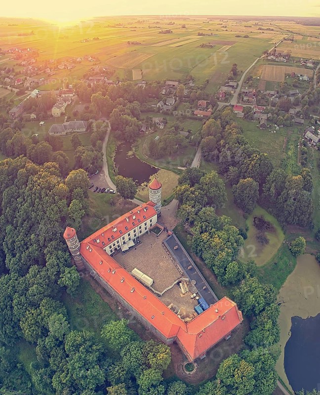 Aerial vertical panoramic view to historical Panemune castle and lithuanian countryside during the sunset. Vintage aerial Background. Panemune. Lithuania