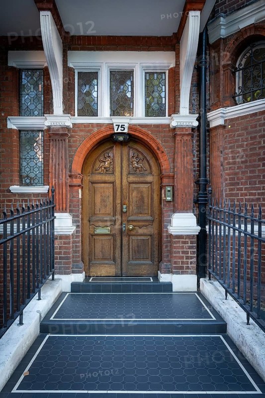 Elaborately designed house entrance, Victorian brick town house, Cadogan Gardens, Borough of Chelsea and Kensington, London, England, Great Britain