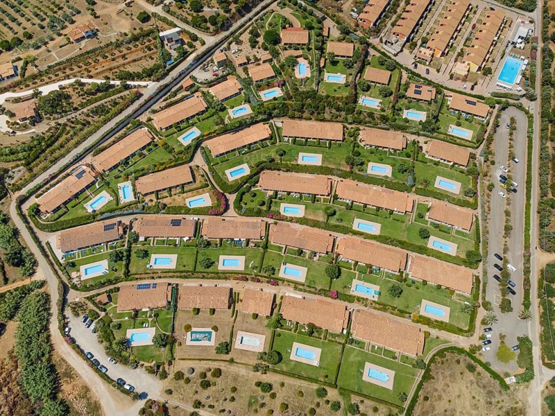 A typical holiday accommodation on the Italian island of Sardinia: during the peak summer season, most accommodation is fully booked. (Aerial view taken by drone), Foxi Manna, Tertenia, Sardinia, Italy