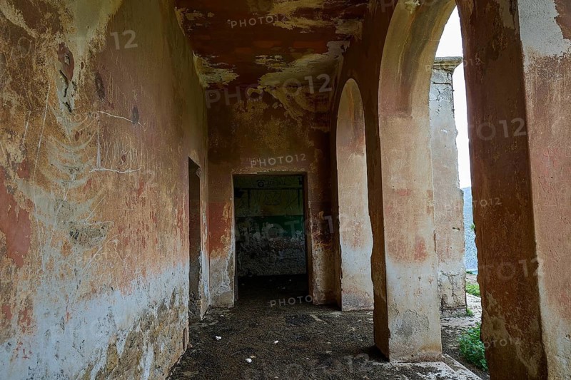 Dilapidated corridor with worn walls and arches in a historic ruined building, Lost Place, Tourtouras Mountain, WW2, World War II, German coastal battery PL 388, marine artillerymen, Diapori, Xirokambos, Leros, Dodecanese, Greek Islands, Greece