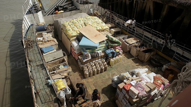 Cargo on a ship with various packaged raw materials, ferry to Bubaque, Bissagos, Bijagos Archipelago, in the port of Bissau, Guinea-Bissau