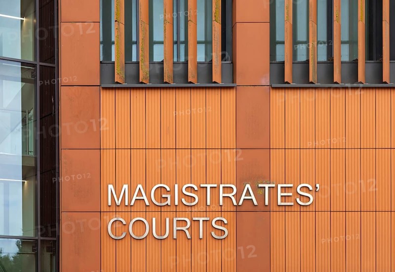 Sign for Magistrates' Courts on side of court building, Colchester, Essex, England, UK designed by H2O Architects 2012
