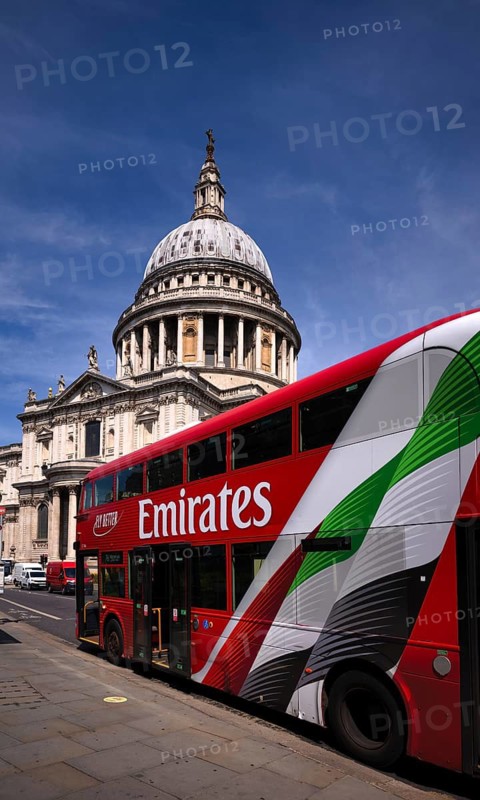 Double-decker bus, advertisement, EMIRATES airline logo, behind St Paul's Cathedral, St. Paul's Cathedral, City of London, London, England, Great Britain, Great Britain