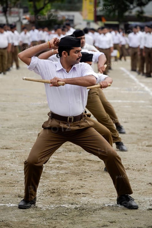 Rashtriya Swayamsevak Sangh (RSS) volunteers participate in an annual event, in Guwahati, Assam, India on Sunday, April 3, 2022. The Rashtriya Swayamsevak Sangh is a Hindu nationalist, paramilitary volunteer organisation