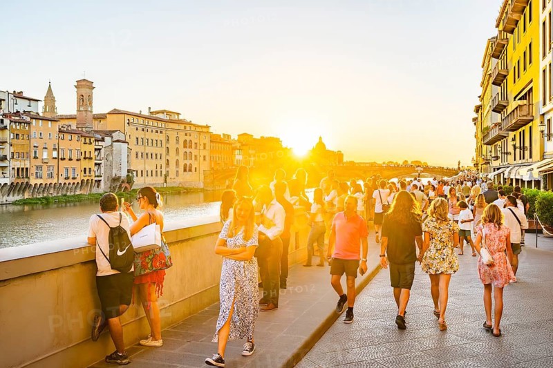 Promenade at arno river at sunset, Florence, UNESCO World Heritage Site, Tuscany, Italy