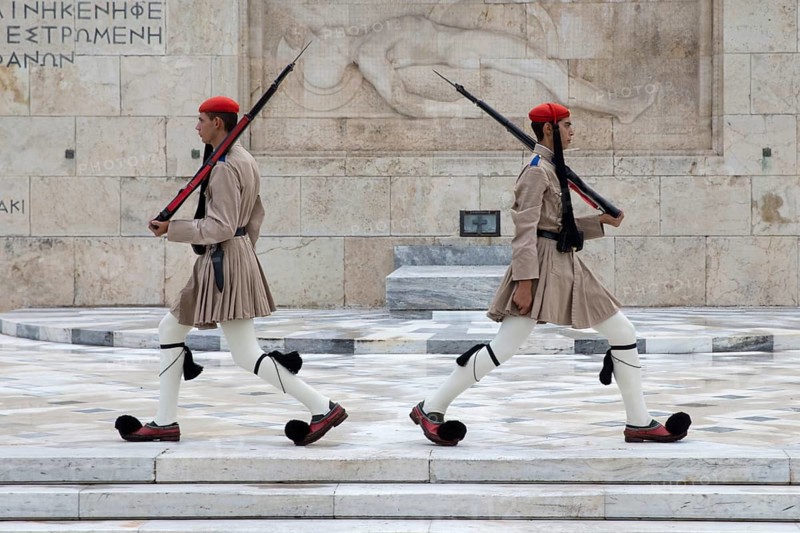 Evzones of the Parliament Guard marching past the Greek Parliament Athens, Greece