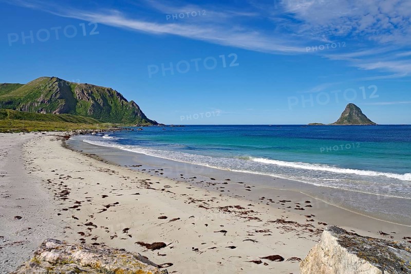 White sandy beach with views of mountains and a distant island under clear skies, Bleik, Bleiksoya, Andøya, Nordland, Norway