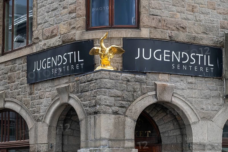 Entrance area with golden swan, symbol of the former swan pharmacy, today Museum Jugendstilsenteret og KUBE, Ålesund or Alesund, Møre og Romsdal Fylke, Norway
