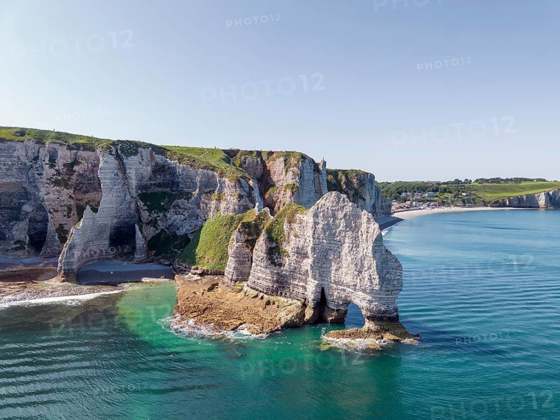 Aerial view of the Falaise d'Amont rock formation with the Porte d'Amont rock gate at low tide, Étretat, Alabaster Coast, La Côte d'Albâtre, chalk cliffs, English Channel, Seine-Maritime, Normandy, France