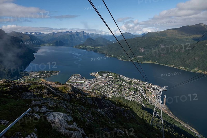 View from the Romsdal gondola or cable car or Romsdalsgondolen from Romsdalsstigen to Åndalsnes or Andalsnes and surrounding mountainous landscape around Romsdalsfjorden, Rauma municipality in Møre og Romsdal province, Norway