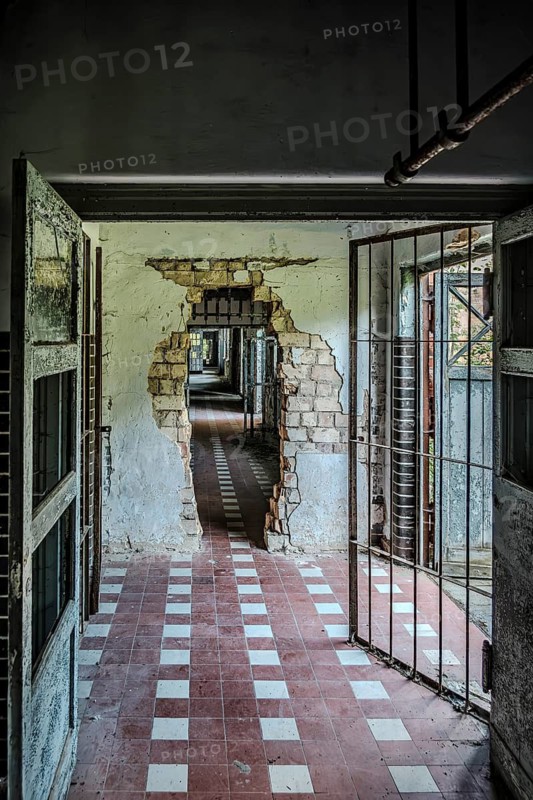 Long dilapidated corridor in the former lung sanatorium and lost place health resort Grabowsee, Oranienburg, Brandenburg, Germany