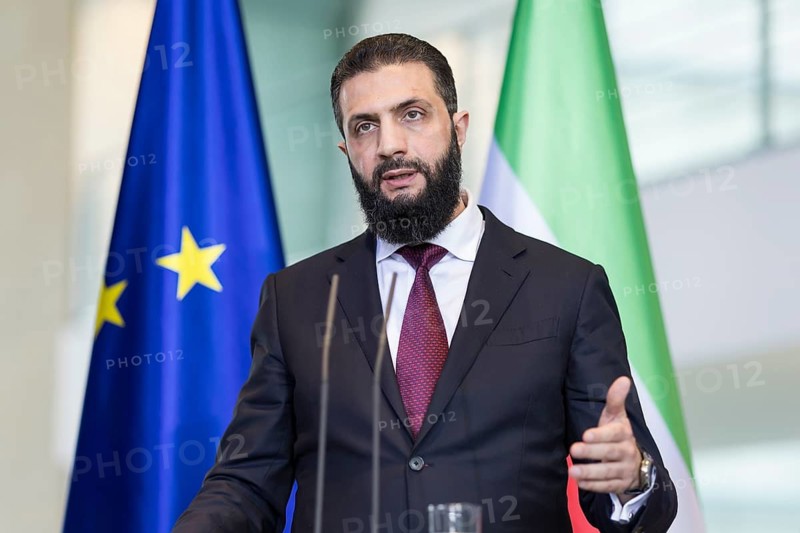 Ahmed al-Sharaa (President of the Syrian Arab Republic) at a joint press conference with Friedrich Merz (Chancellor of the Federal Republic of Germany, CDU) after a one-on-one meeting at the Federal Chancellery, Berlin, 30 March 2026