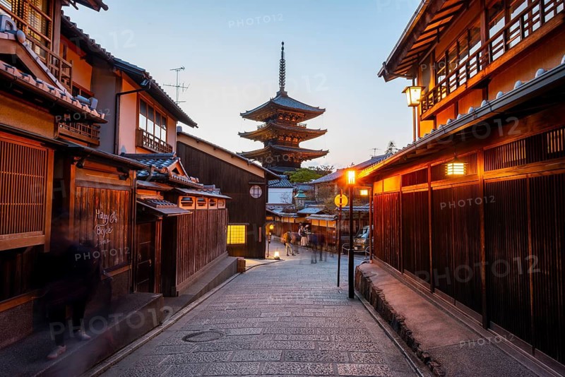Yasaka dori historic street in the old town with traditional Japanese houses, five-story Yasaka Pagoda of the Buddhist Hokanji Temple at the back, evening mood, blue hour, Higashiyama, Kyoto, Japan