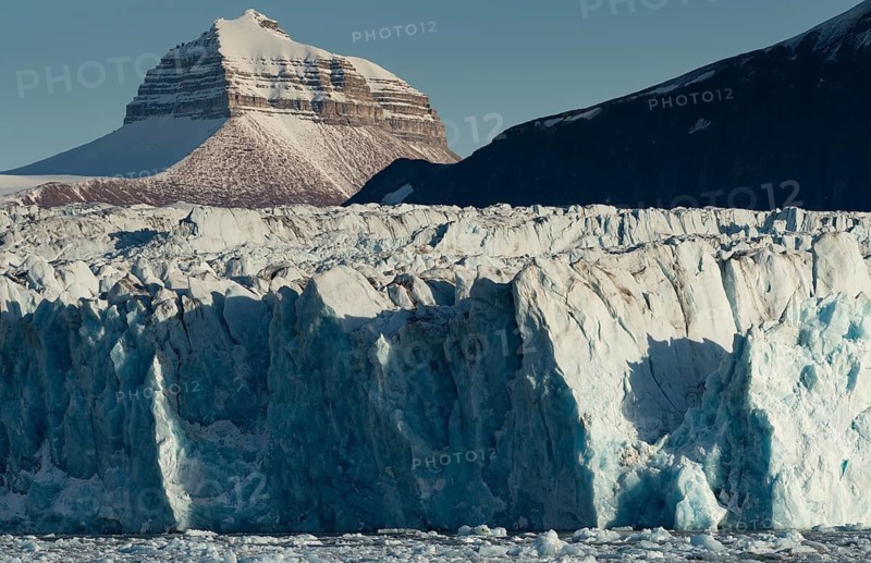 Glacier front and one of the three mountains: Tee Kroner (Three Crowns), Kronebreen or Kronengletscher Glacier, Kongsfjord or Kongsfjorden, the Svalbard archipelago, Svalbard, Norway
