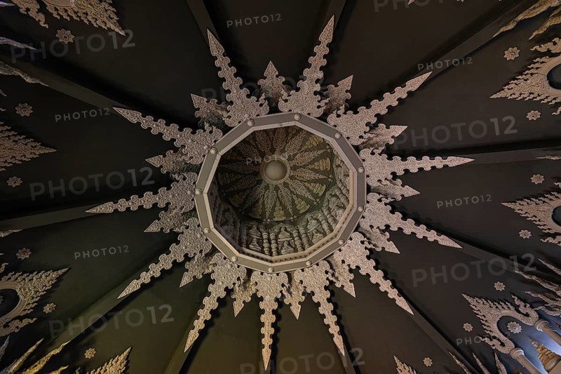 Decorated vaulted ceiling of the public prayer hall in the Buddhist temple complex Wat Phra That Don Phra Chan, near Lampang, Lampang Province, Thailand