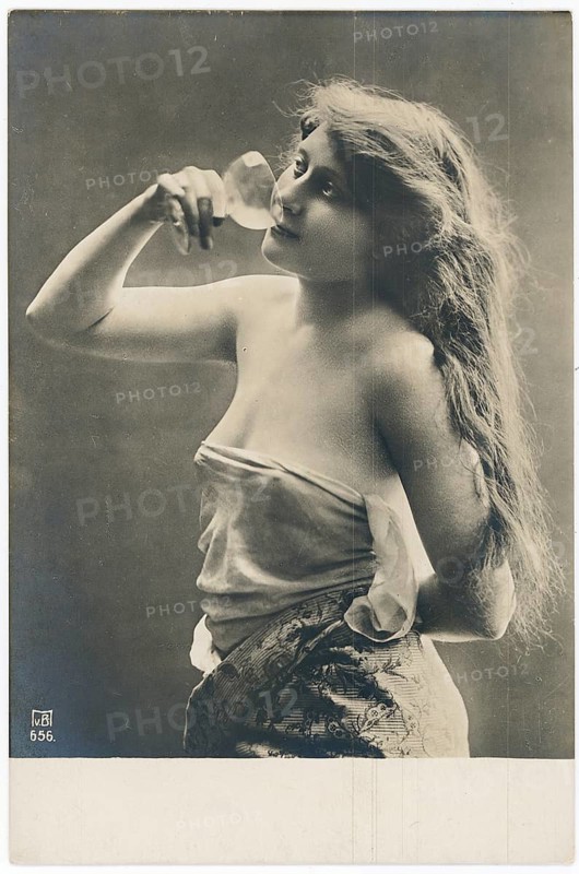 Art Nouveau, young woman, grace, woman with long hair drinking elegantly from a glass, dreamy expression, around 1910
