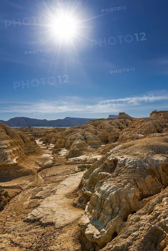 Rock formation caused by erosion in the morning backlight in the Bardenas Reales Natural Park, Navarra, Spain