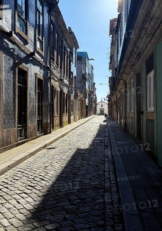 Rua do Pinheiro Street, a narrow and narrow typical street in the old town with the Capela de Nª Srª da Conceição da Quinta do Pinheiro at the end, Porto, Portugal