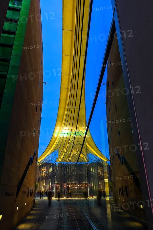 Reflection in the façade of the State Museum of Art and Design at dusk, Nuremberg, Middle Franconia, Bavaria, Germany