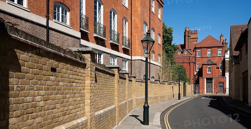 Narrow street lined with historic brick buildings and a brick wall, quiet residential area, Chelsea, London, Great Britain, England, Great Britain