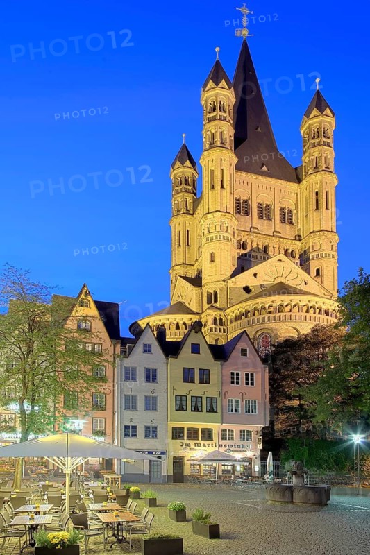 Martinswinkel with St. Martin church illuminates Cologne Germany