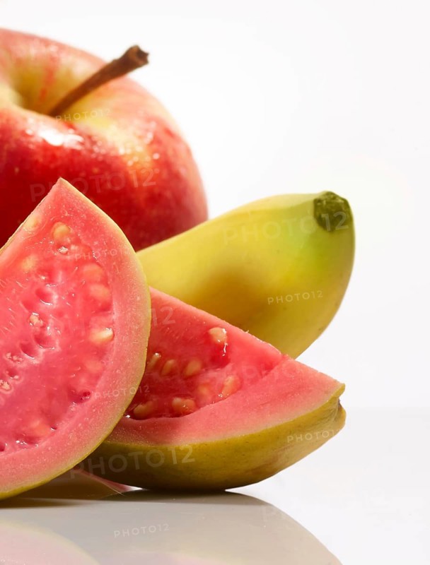 Apple, banana and guava against white background, studio shot