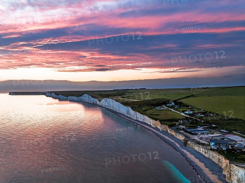 Sunset over Seven Sisters Cliffs from a drone, English Channel, East Sussex, South-east England