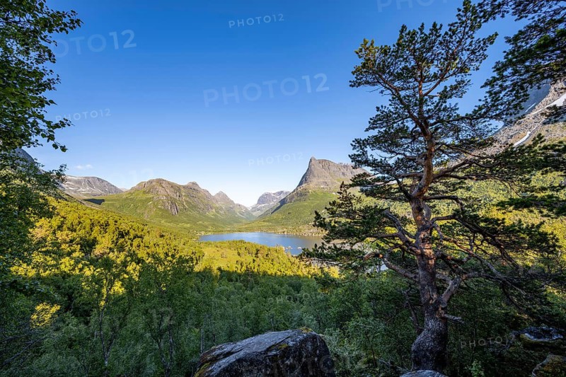 Picturesque mountain landscape in the Innerdalen high valley, Innerdalstårnet peaks and Lake Innerdalsvatna, Trollheimen Mountain Area, Sunndal, Møre og Romsdal, Norway