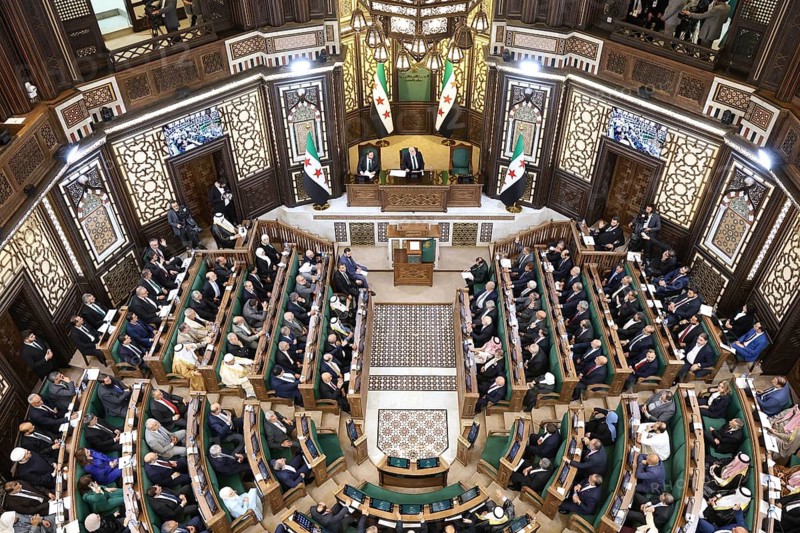 Damascus, Syria - July 12, 2026: Members of Syria's newly formed People's Assembly attend the body's inaugural session in Damascus representing the first parliament conv, Damascus, Syria