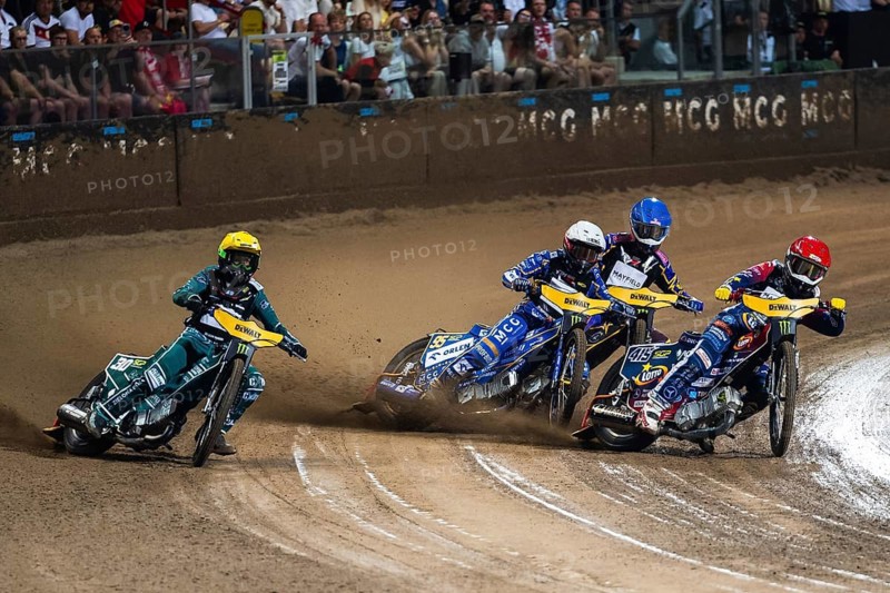 WROCLAW, POLAND - JUNE 20, 2026: DEWALT FIM Speedway GP of Poland. Speedway riders competing on dirt track. Heat 3. Leon Madsen (Y) Bartosz Zmarzlik (W) Dominik Kubera (R) Kacper Woryna (B)