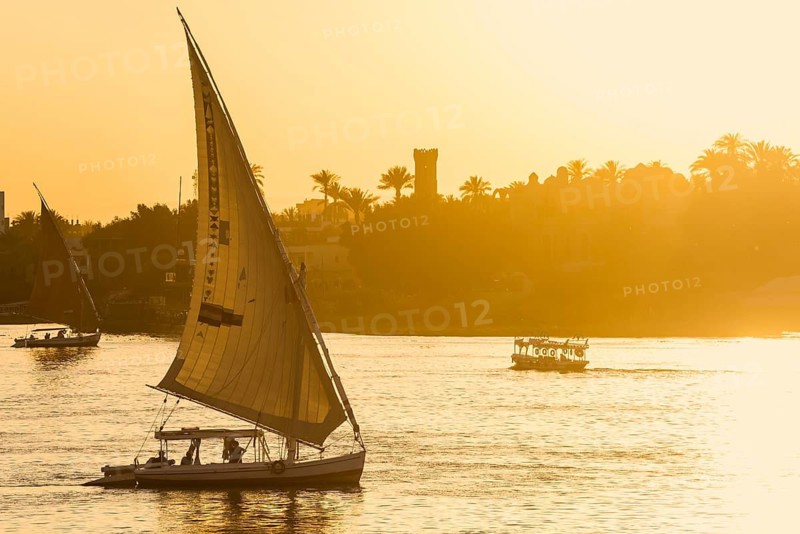 Sailing ships, feluks on the Nile, sunset, Luxor, Egypt