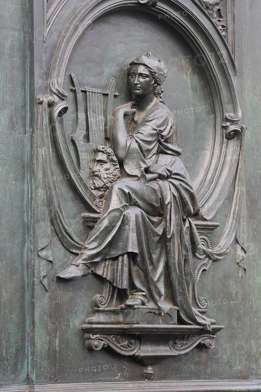 Grey monochrome relief, musician with lyre, allegory for opera Fidelio, symbol, composition, harp player, music, Beethoven memorial, Münsterplatz, center, Bonn, North Rhine-Westphalia, Germany