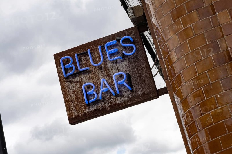 Neon sign for a Blues Bar in Camden Town, London, a popular neighbourhood of the city for nightlife and entertainment. England UK
