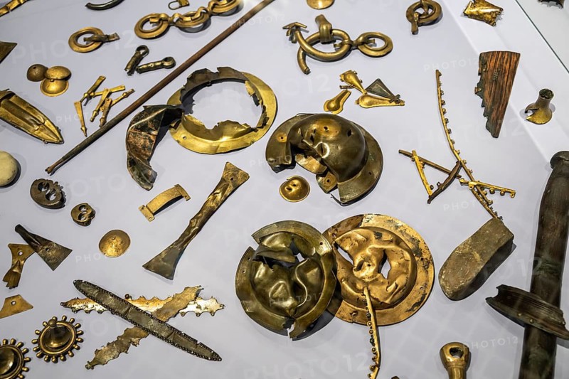 Various ancient Roman metal utensils, helmets and buckles, Varus Battle Roman Museum Kalkriese, Bramsche, Lower Saxony, Germany
