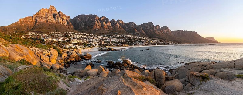 Evening on the coast, beach near Camps Bay, with table mountains, blue sea, Cape Town, South Africa