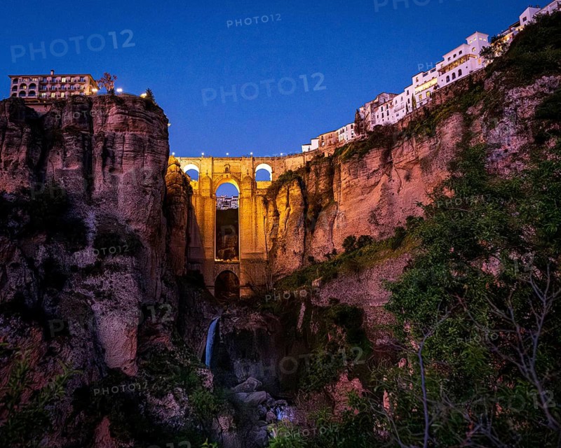 Famous bridge over Ronda gorge in the evening light, Ronda, Spain