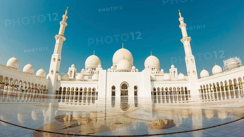 Abu dhabi, UAE, 3rd october, 2022: Grand Mosque in Abu Dhabi mid day in hot weather. Wide low angle panorama of exterior of Sheikh Zayed Mosque. Abu dhabi. UAE