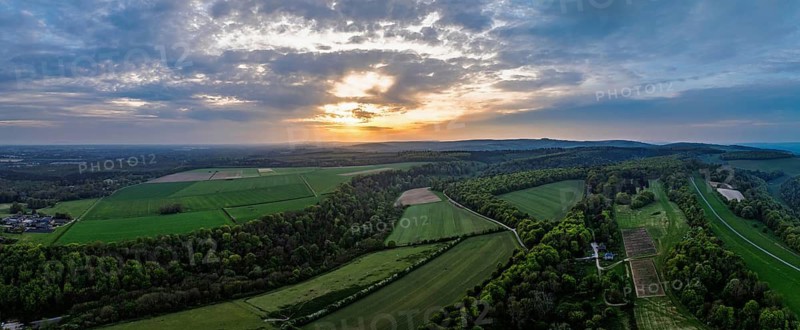 Sunset over Arundel fields and farms from a drone, Arundel, West Sussex, England, United Kingdom