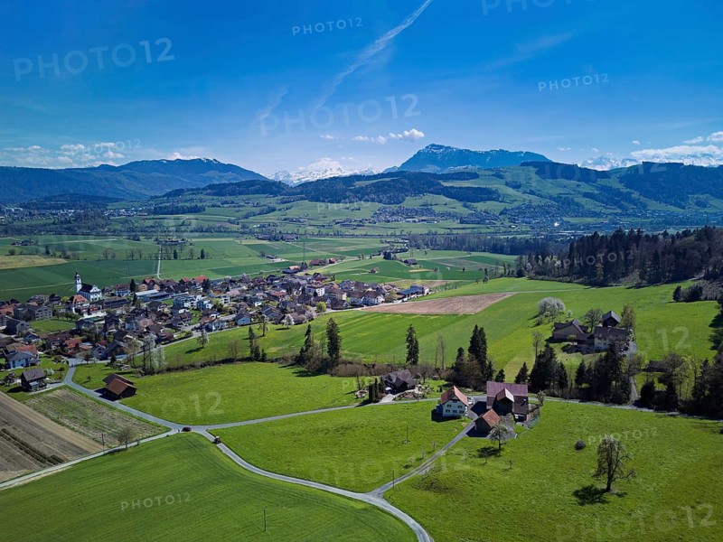 View of the village with the Alps with the Rigi in the background, Dietwil, Freiamt, Canton of Aargau, Switzerland