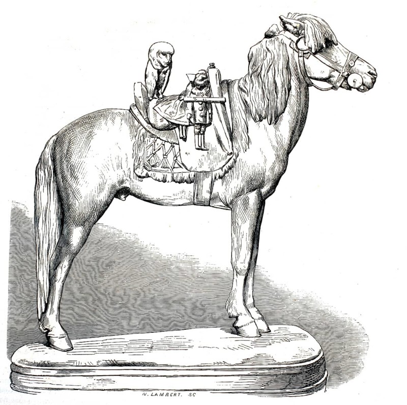 Sculpture of a horse with a saddle with a monkey and a small doll sitting on it. The horse is depicted in great detail with saddle gear, saddle pad and reins and stands on a sturdy, rounded wooden platform, which is typical of historical automata, carousel figures or collector toys of the 19th century, authentic, high-resolution reproduction from a 19th century original, exact date of presentation unknown, historical