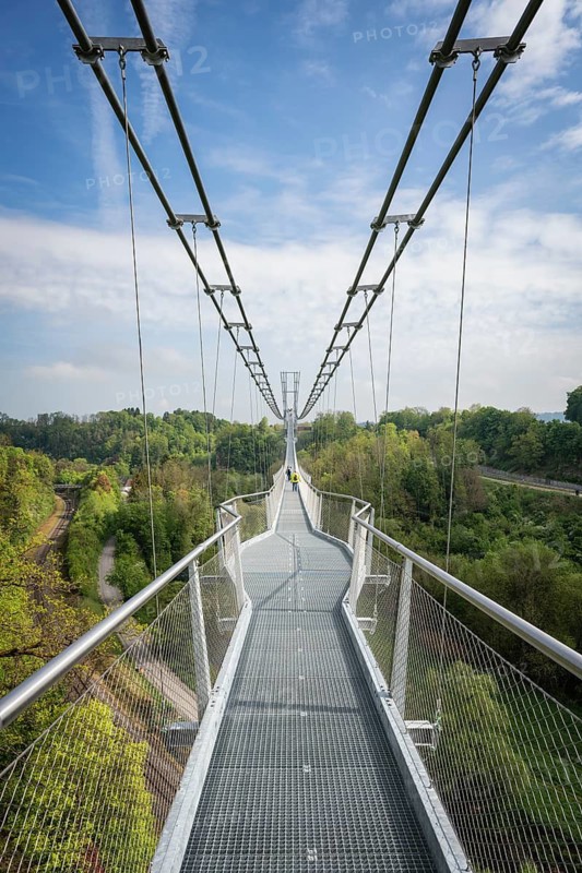 The Neckarline, a pedestrian suspension bridge up to 60 meters high with a wingspan of 606 meters above the Neckar Valley. The tourist attraction, built from a total of 444 tons of steel, serves to connect the historic old town and Bernese Field, where the 246 meter high TK Elevator test tower with the highest viewing platform in Germany is located. The Neckarline is the longest suspension bridge in southern Germany, Rottweil, Rottweil district, Baden-Württemberg, Germany