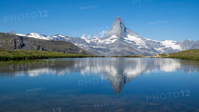 View of the majestic Matterhorn reflected in Stellisee, Zermatt, Valais, Switzerland