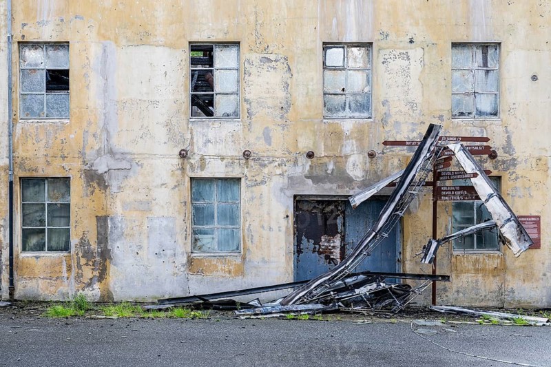 Dilapidated building, historic Devold factory, Devoldfabrikken, outlet center in Langevåg, near Ålesund or Alesund, Møre og Romsdal Fylke, Norway