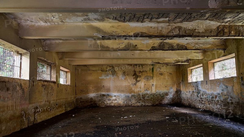 Empty space with lattice windows and damaged paint, radiates a barren historic atmosphere, Lost Place, Tourtouras Berg, Coastal Battery, WW2, World War II, German Coastal Battery PL 388, Marine Artillerists, Diapori, Xirokambos, Leros, Dodecanese, Greek Islands, Greece
