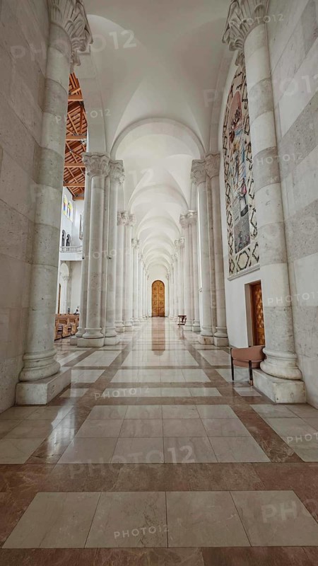 Majestic interior of a mosque with tall marble columns, Pristina, Kosovo