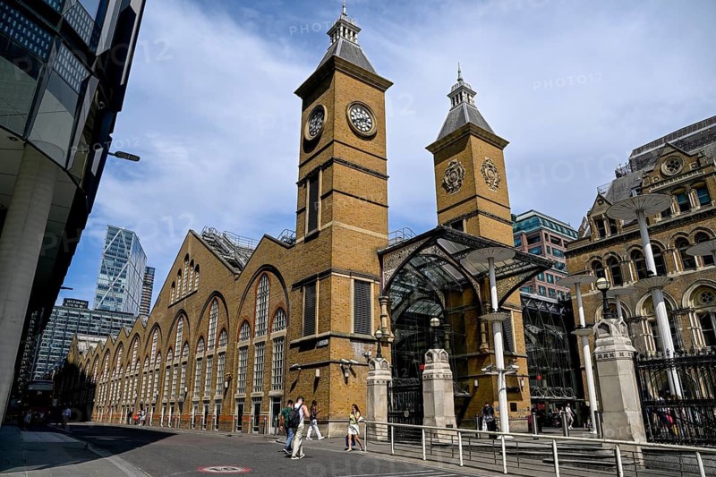 Travelers in front of Liverpool Street Station, Victorian-era building designed by engineer Edward Wilson, Broadgate district, City of London, London, England, Great Britain, Great Britain
