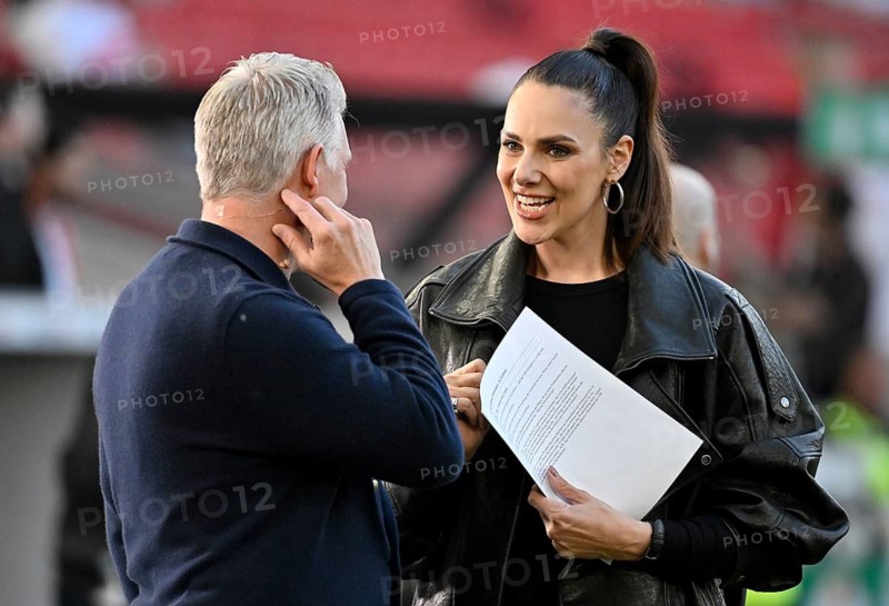 Bastian Schweinsteiger in interview, discussion with presenter reporter ARD Esther Sedlaczek, smiles, soccer Bundesliga, DFB-Pokal, MHPArena, MHP Arena Stuttgart, Baden-Württemberg, Germany