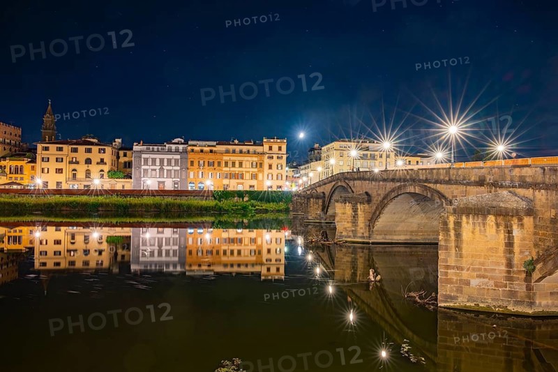 Promenade with arno river in front at blue hour, Florence, UNESCO World Heritage Site, Tuscany, Italy