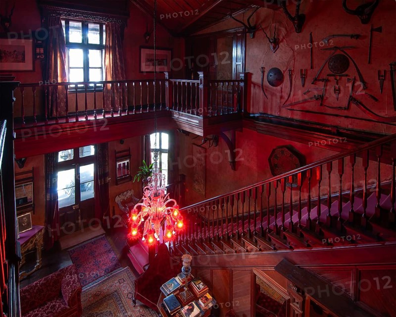 Entrance area with weapons and hunting trophies, Chapslee Hotel, former summer residence of Raja of Kapurthal, Elysium Hill, Lakkar Bazar, Shimla, Himachal Pradesh, North India, India