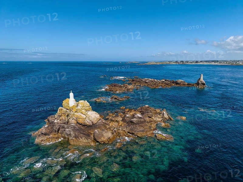 Aerial view of an upstream rock formation with fairway beacons on the Breton coast, Trémazan, Landunvez, Finistère, Brittany, France